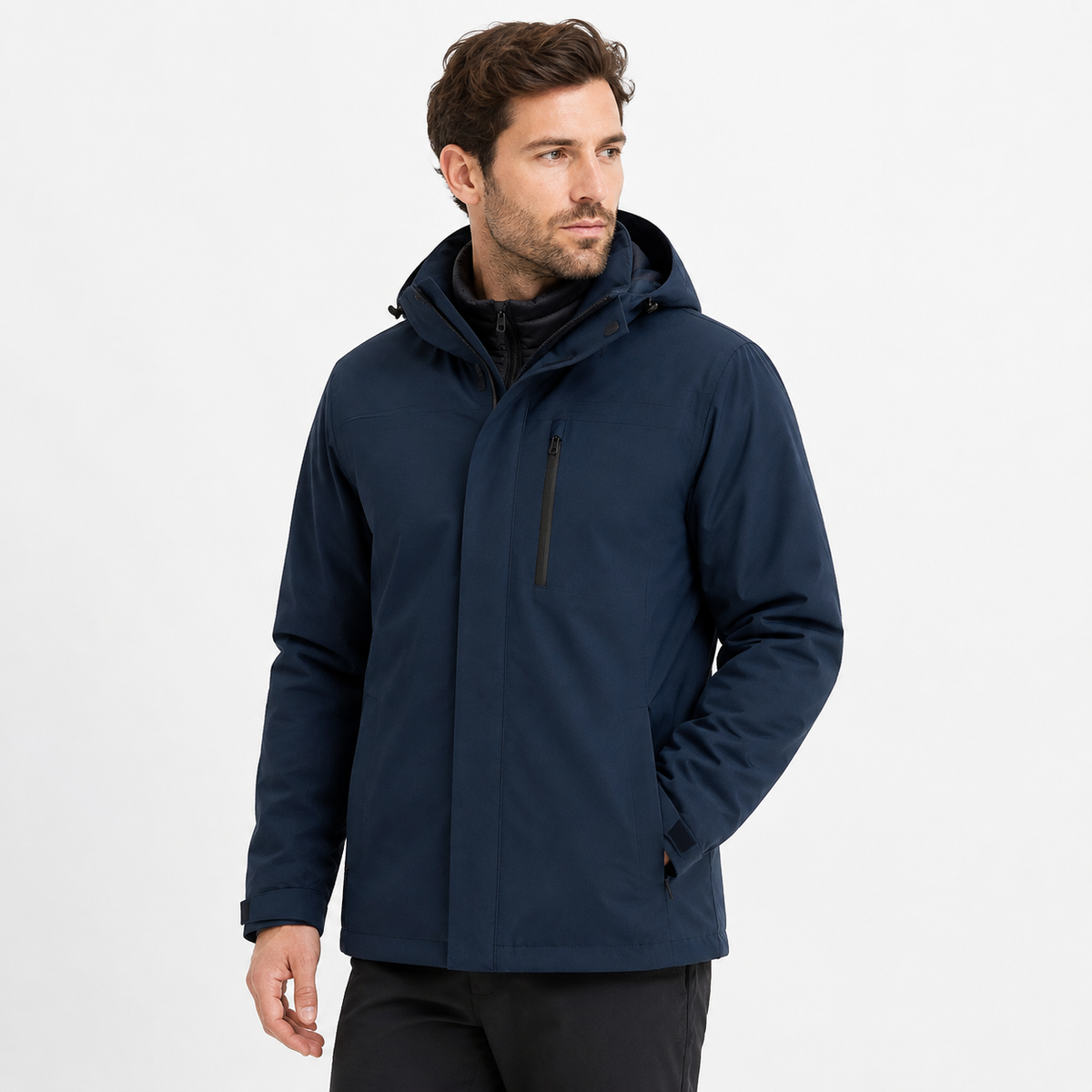 Man wearing the Angular Core navy 3-in-1 waterproof down jacket on a white background